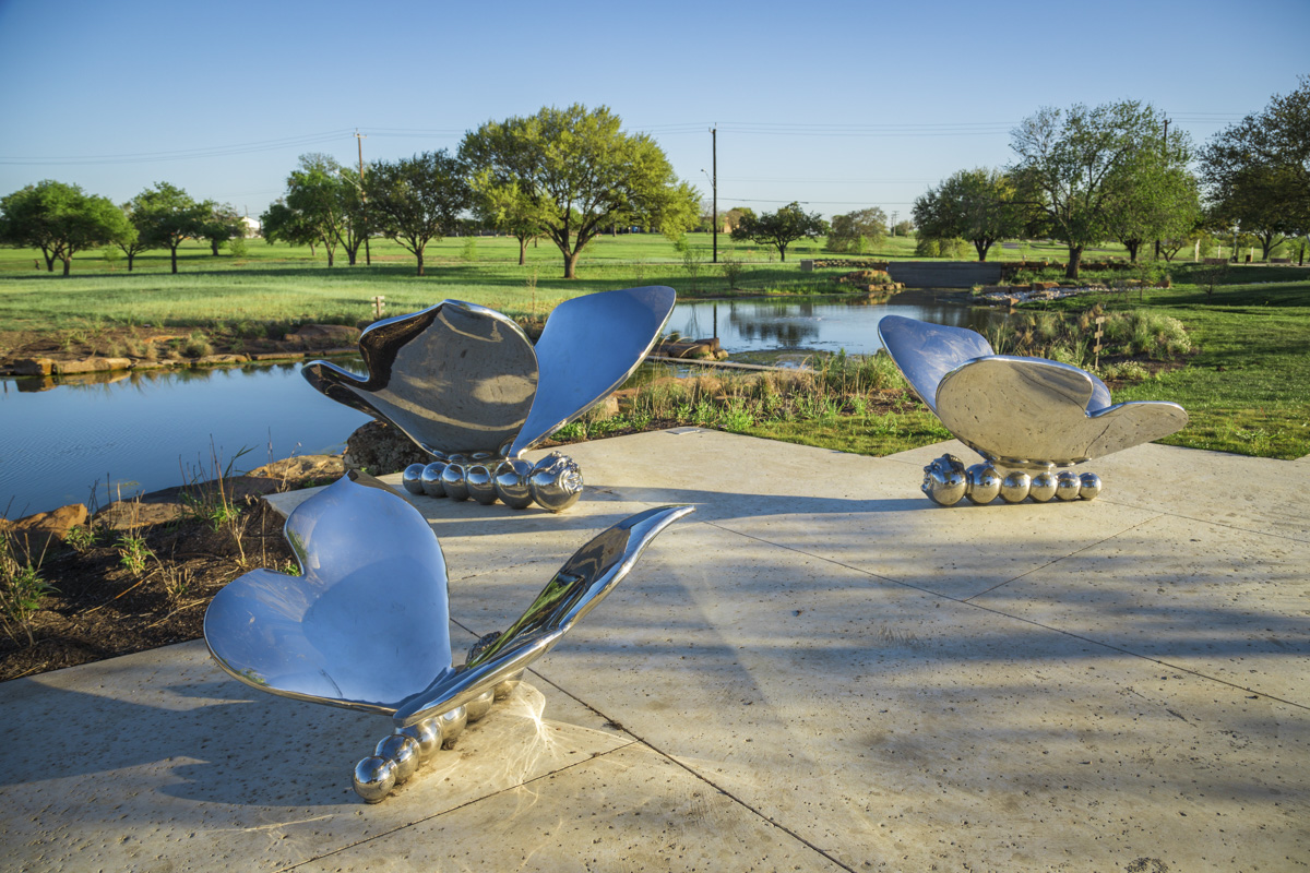 Brooks Butterfly sculpture trio water reflection Brad Oldham Sculpture San AntonioEdit